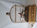 Large triple antique singing bird-in-cage, by Phallibois