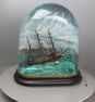 A large classic rocking ship musical automaton under painted glass dome