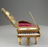 Antique gilt metal and pictorial enamel grand piano-form Musical Box