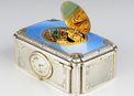 A very fine silver gilt and enamel singing bird box with timepiece, by C. H. Marguerat