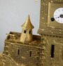 Antique gilt bronze castle fort timepiece, with rocking ship automaton