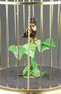 Small single singing bird-in-cage, by Karl Griesbaum