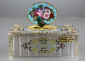 An exceptionally important and early silver, parcel-gilt, enamel and gilt appliques singing bird box, by Charles Bruguier