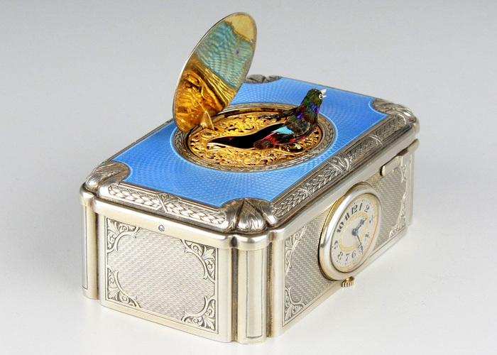 A very fine silver gilt and enamel singing bird box with timepiece, by C. H. Marguerat