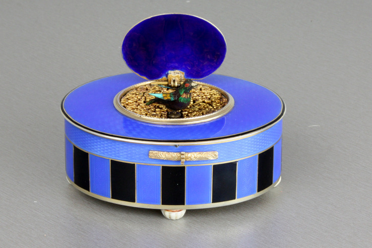 Silver-gilt and duet enamel oval singing bird box, by C. H. Marguerat