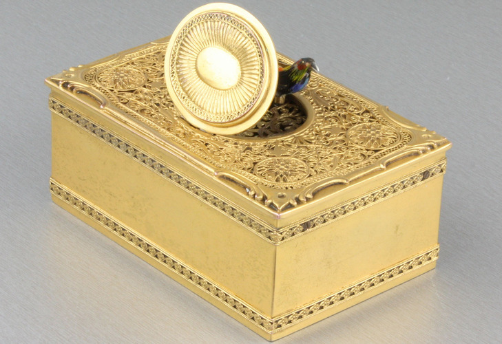 Vintage gilt metal and filigree panel singing bird box, by Karl Griesbaum