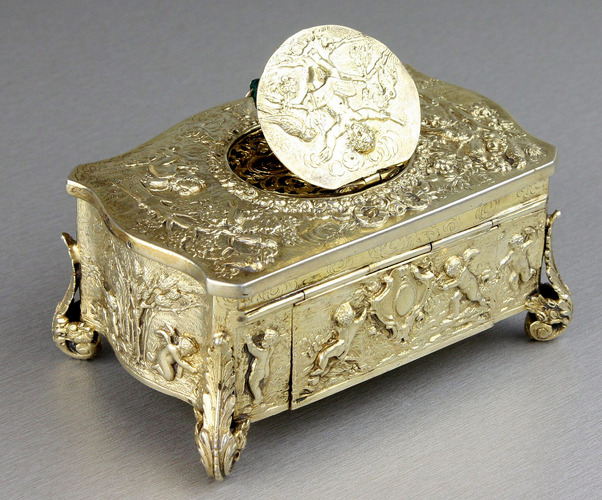 Vintage silver-gilt bow-front form singing bird box, by Karl Griesbaum