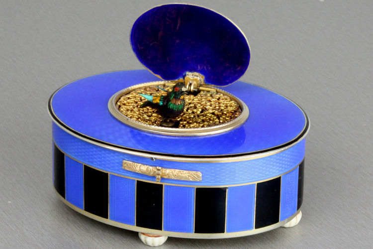 Silver-gilt and duet enamel oval singing bird box, by C. H. Marguerat