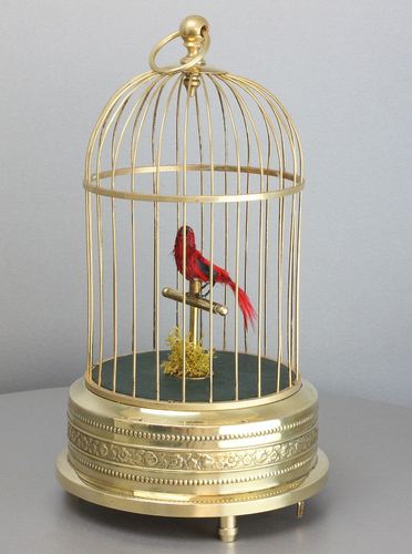 A small single singing bird-in-cage, by Karl Griesbaum