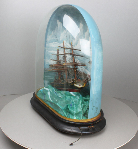 A large classic rocking ship musical automaton under painted glass dome