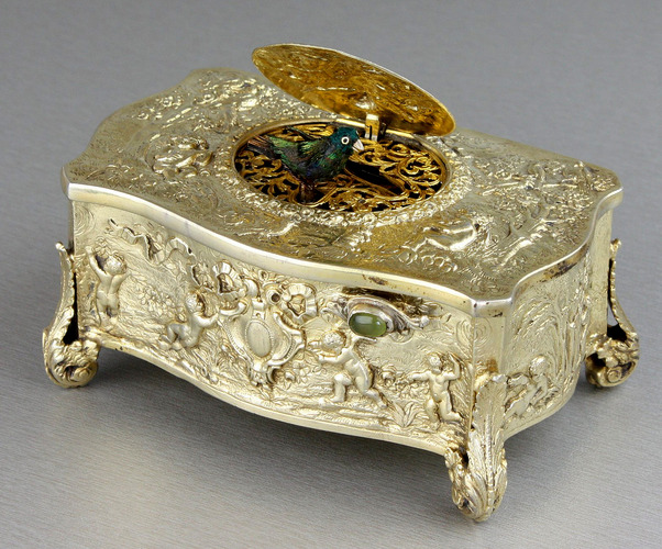 Vintage silver-gilt bow-front form singing bird box, by Karl Griesbaum