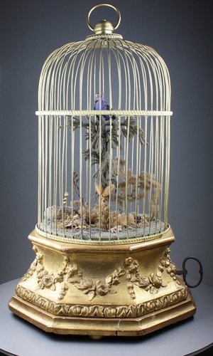 Antique Hexagonal-profile large single singing bird-in-cage, by Phallibois
