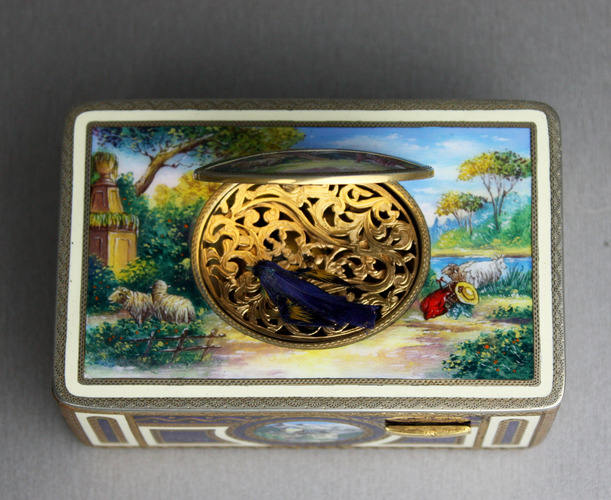 vintage gilt metal and full pictorial enamel singing bird box, by Karl Griesbaum