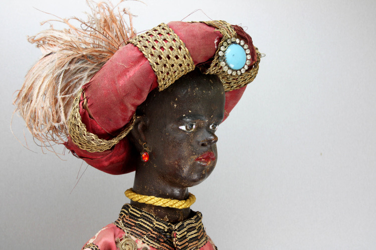 Very rare and early antique standing Blackamoor dice magician automaton