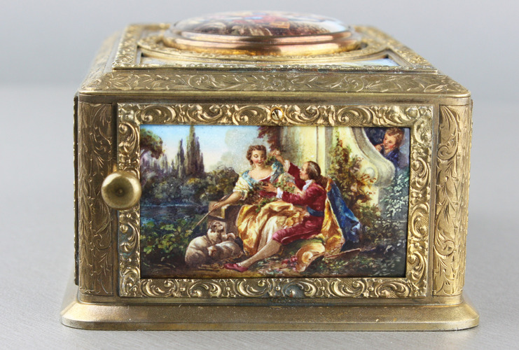 Tooled gilt bronze and enamel singing bird box